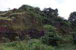 An old quarry in Batoke, Limbe, where a 10m vertical wall has been left after excavation since 2015, posing a threat to farmers and passing locals