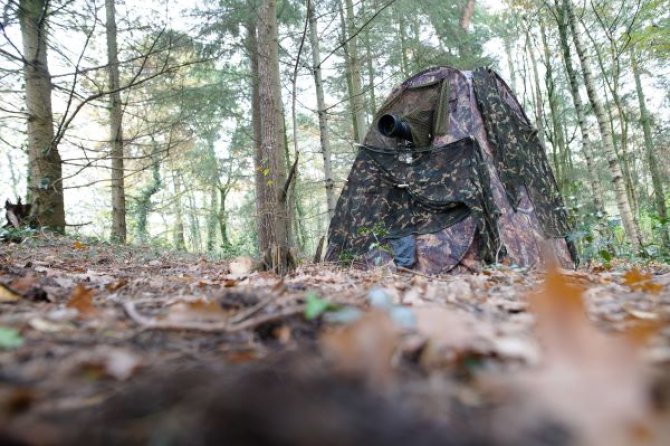 A camouflage hut is essential to Jeffrey's work